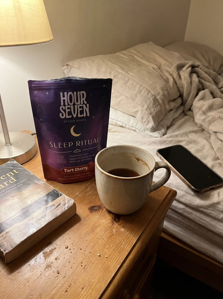 Hour Seven Sleep Ritual and a warm mug beside a neatly made bed